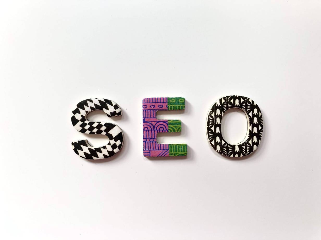 Colourful SEO letters on a white surface Colourful SEO letters on a white surface